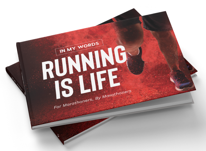 Stack of red Running Is Life books.