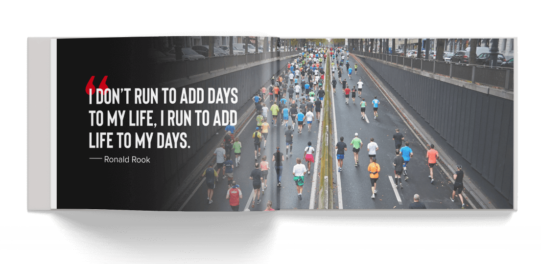 Coffee table book open to a photo of dozens of runners on a road with a quote overlaid reading "I don't run to add days to my life, I run to add life to my days."